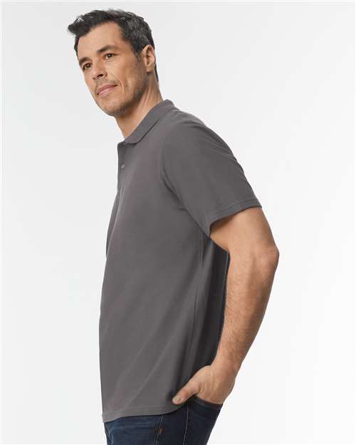 Unisex Softstyle® Pique Polo – On Model – Side
