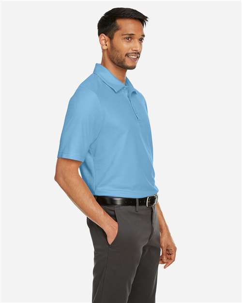 Men's Fusion ChromaSoft™ Pique Polo – On Model – Side