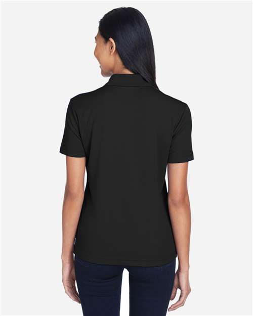 Women's Origin Performance Piqué Polo with Pocket – On Model – Back